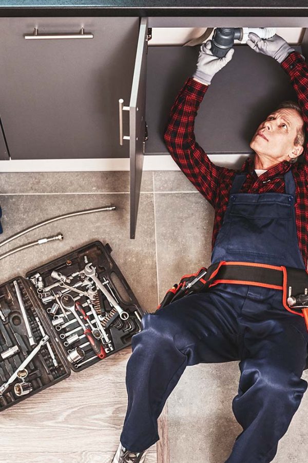 tools-case-top-view-of-seniour-handyman-repairing-resize