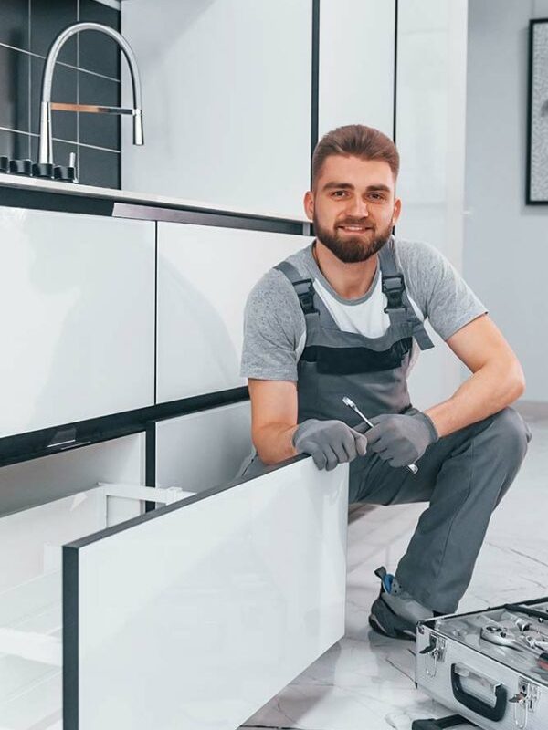 young-professional-plumber-in-grey-uniform-using-e-resize-qwtd2avzs3gxdqjxdmy142lbkzpmdjojdoyvtesx7s